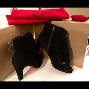 Christian Louboutin, black suede, tassel bootie.